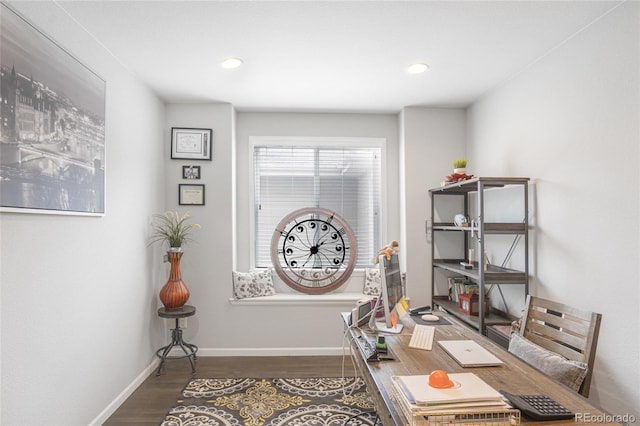 office space with dark hardwood / wood-style flooring