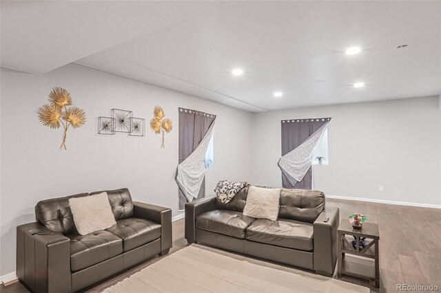 living room with light hardwood / wood-style flooring