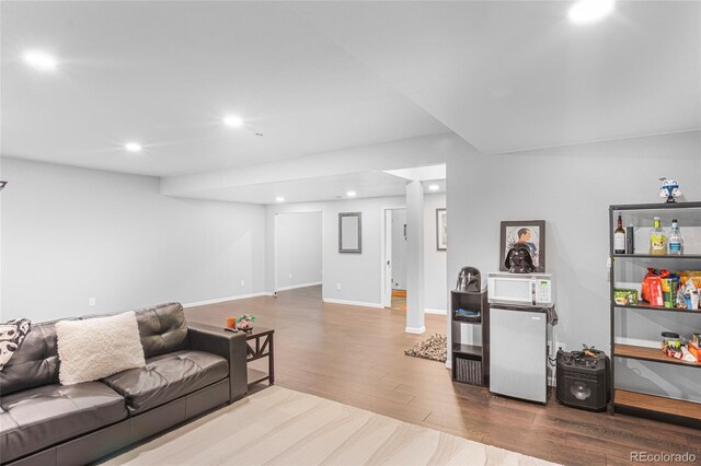 living room with hardwood / wood-style floors