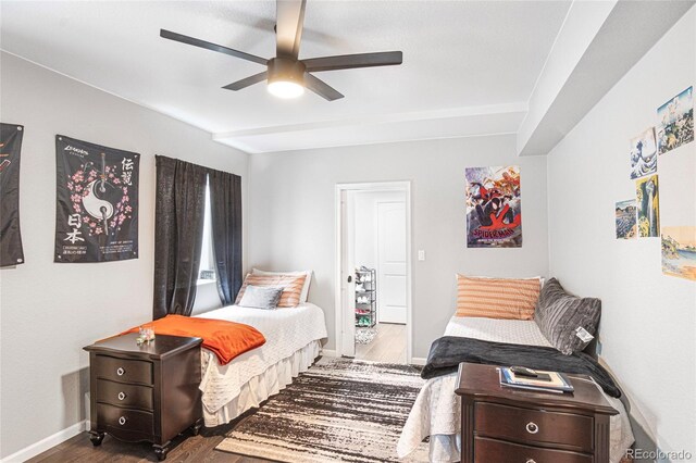 bedroom featuring ceiling fan and dark hardwood / wood-style flooring