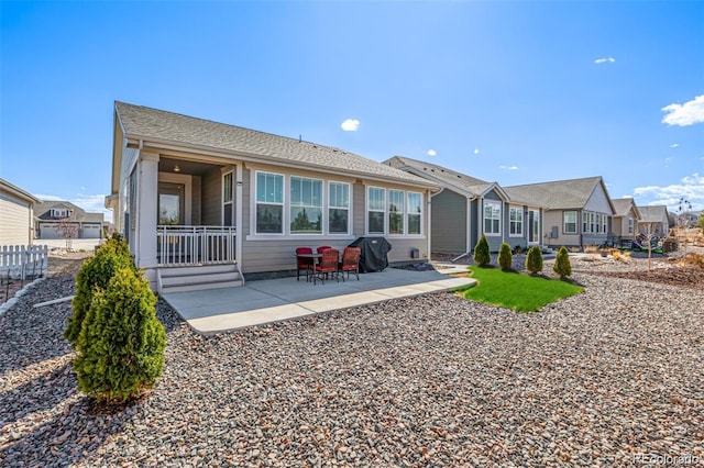 15979 Xanthia Way, Thornton, CO 80602 - back of house with a patio area
