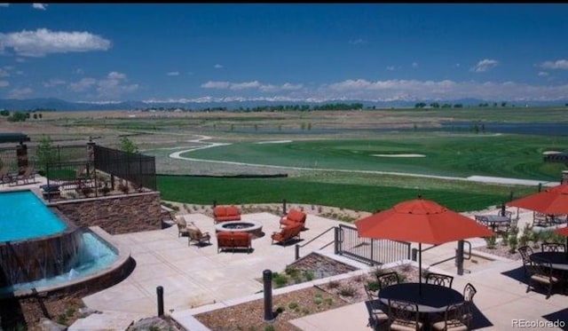 15979 Xanthia Way, Thornton, CO 80602 - view of patio with an outdoor fire pit