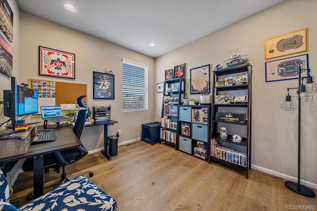 office area featuring recessed lighting, baseboards, and wood finished floors