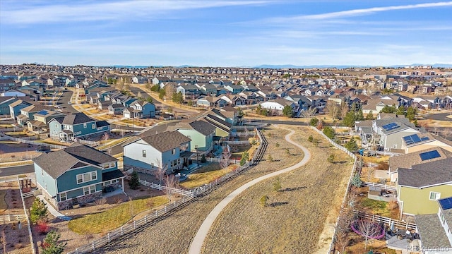 birds eye view of property with a residential view