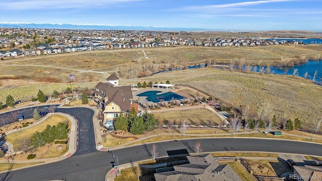 aerial view featuring a water view and a residential view