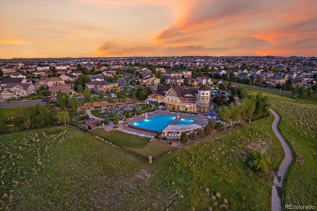 aerial view at dusk with a residential view