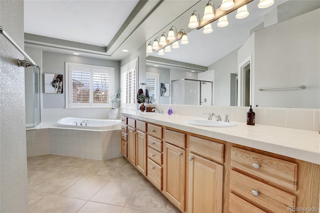 bathroom with vanity, separate shower and tub, and tile patterned flooring