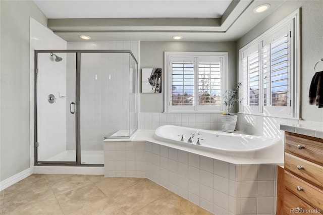 bathroom with vanity, plus walk in shower, and tile patterned flooring