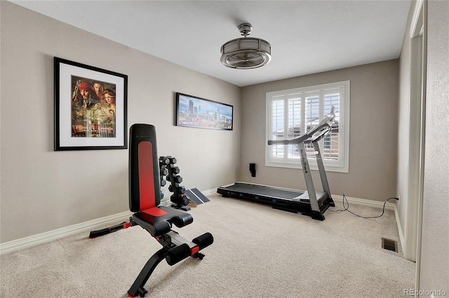 exercise room with carpet floors