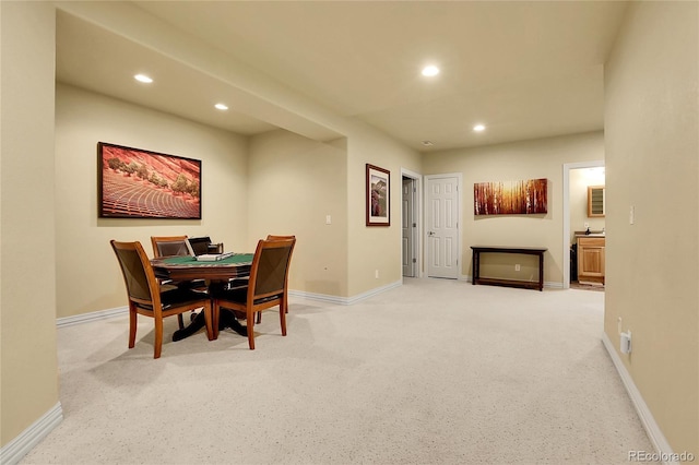 dining area with light carpet