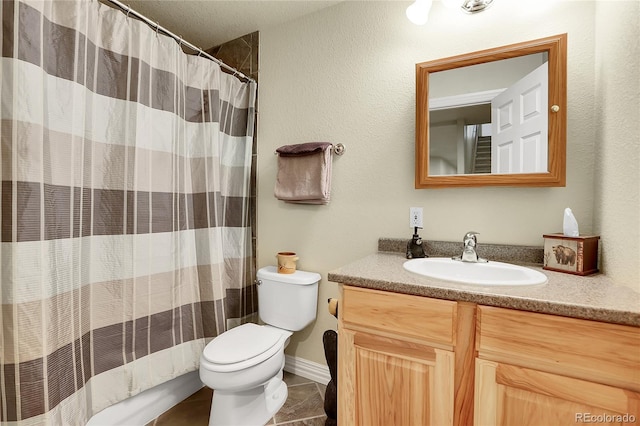 bathroom featuring vanity, tile patterned floors, toilet, and a shower with shower curtain