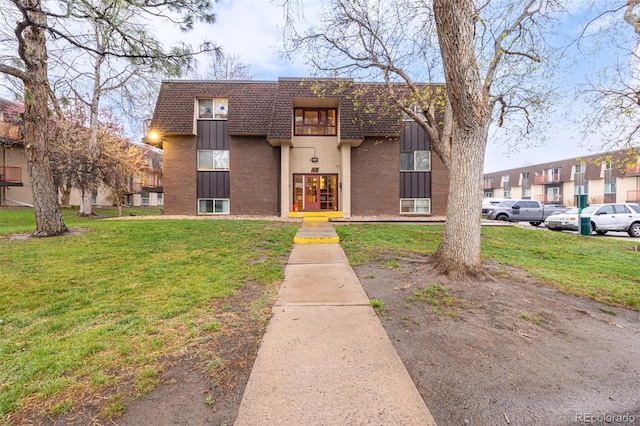 view of front of home with a front yard