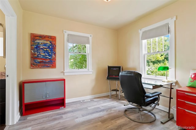 4779 S Bannock St, Englewood, CO 80110 - home office featuring wood finished floors and baseboards