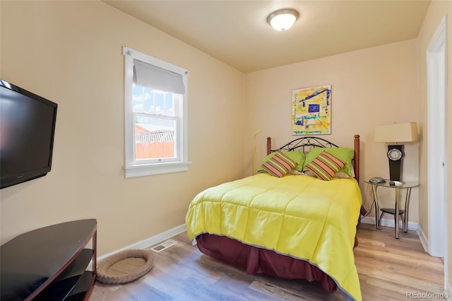 4779 S Bannock St, Englewood, CO 80110 - bedroom with wood finished floors and baseboards