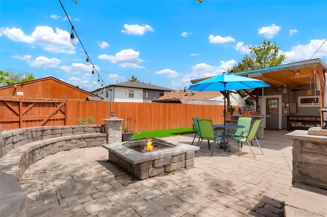 4779 S Bannock St, Englewood, CO 80110 - view of patio / terrace with an outdoor fire pit and outdoor dining area