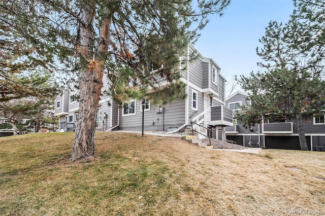 exterior space featuring a front yard