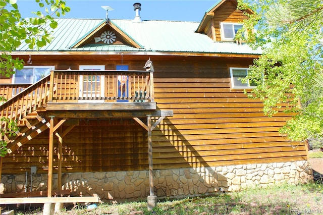 975 Windmill Dr, Hartsel, CO 80449 - back of property featuring metal roof and a deck