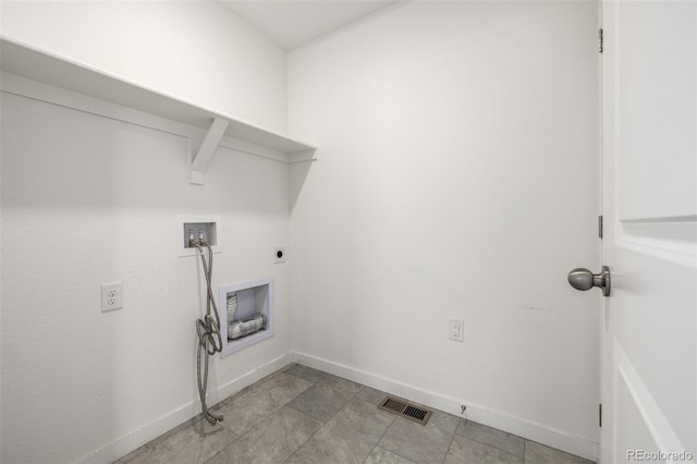 washroom featuring hookup for a washing machine and hookup for an electric dryer