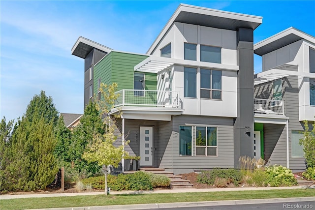 contemporary home featuring a balcony