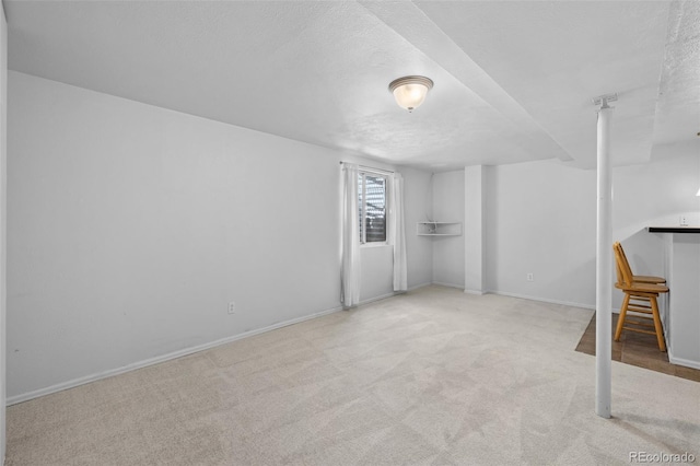 8761 Cloverleaf Cir, Parker, CO 80134 - basement featuring carpet floors and a textured ceiling