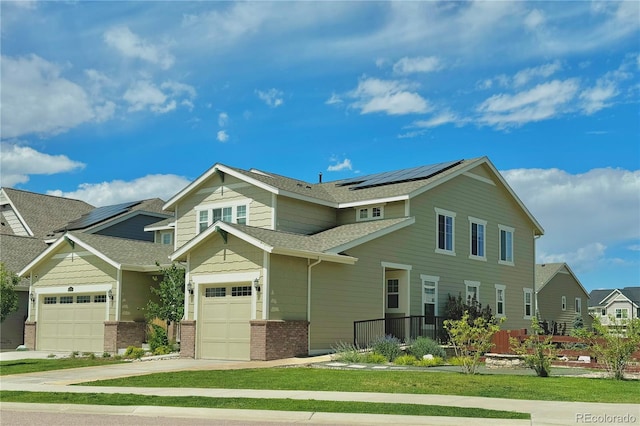 craftsman-style home featuring solar panels