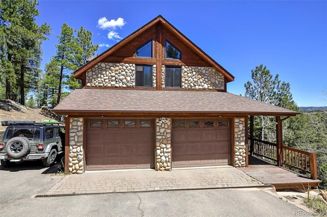 320 Summit Rd, Woodland Park, CO 80863 - garage with asphalt driveway