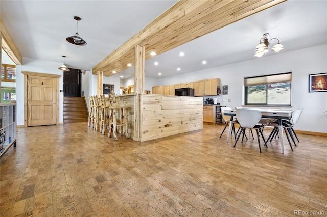 320 Summit Rd, Woodland Park, CO 80863 - dining area featuring healthy amount of natural light, light wood-style floors, recessed lighting, stairway, and baseboards