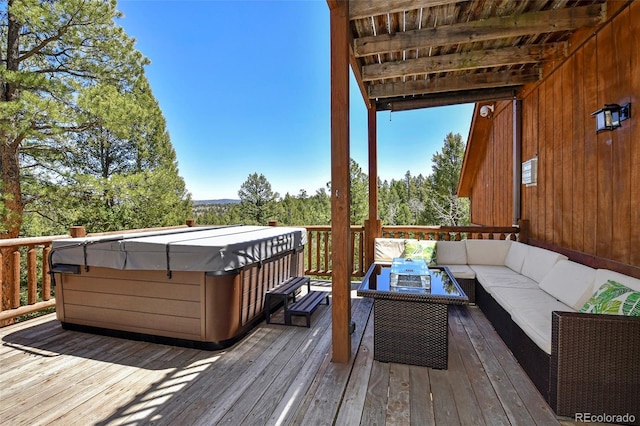 320 Summit Rd, Woodland Park, CO 80863 - deck with an outdoor living space and a hot tub