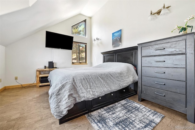 320 Summit Rd, Woodland Park, CO 80863 - bedroom with lofted ceiling and baseboards