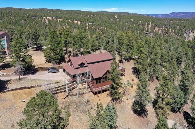 320 Summit Rd, Woodland Park, CO 80863 - view of subject property featuring a forest and a mountain backdrop