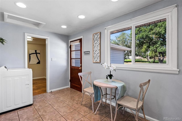 dining space with light tile patterned flooring