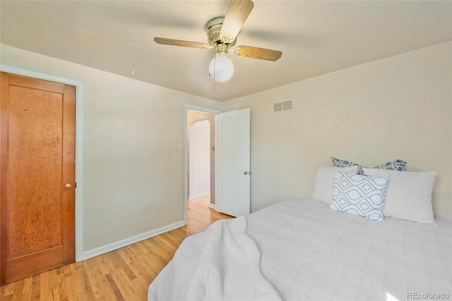 bedroom featuring ceiling fan and light wood-type flooring