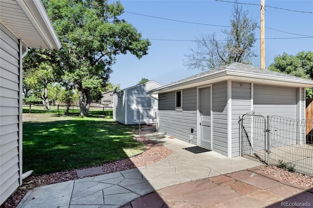 garage with a yard