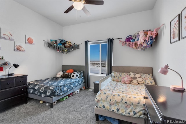 bedroom with ceiling fan and carpet floors