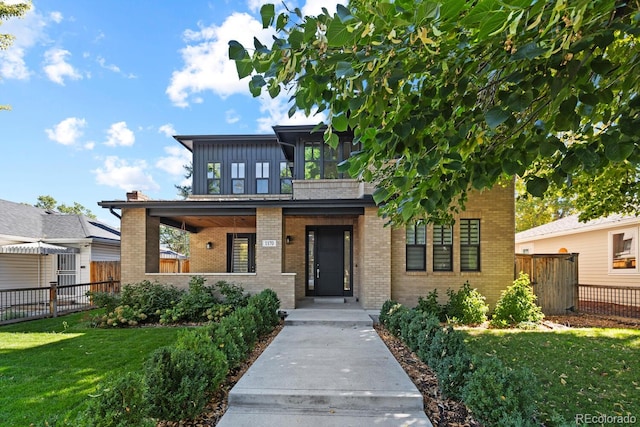 view of front of property with a front lawn