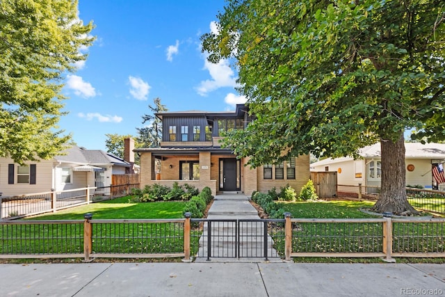 view of front facade with a front yard