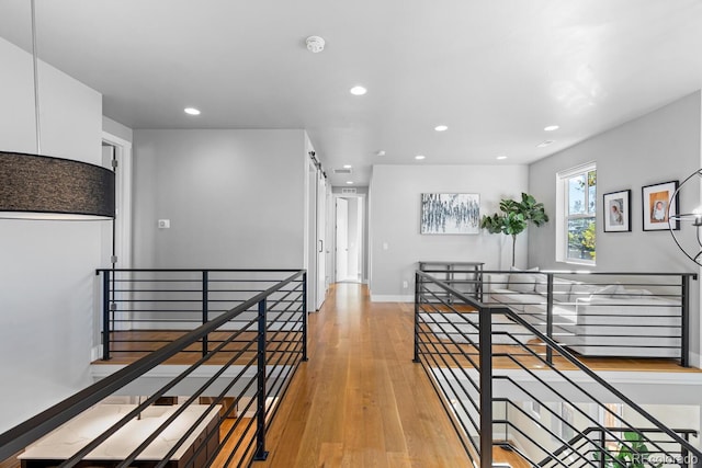 hallway with light wood-type flooring