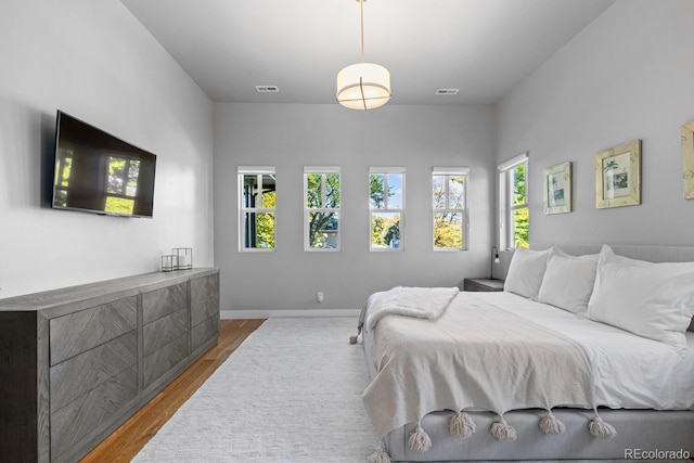 bedroom featuring hardwood / wood-style flooring