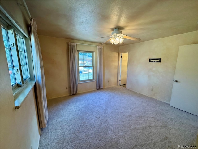 280 Raven Hills Rd, Colorado Springs, CO 80919 - carpeted empty room featuring a ceiling fan