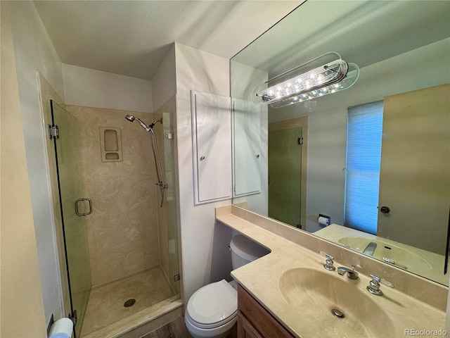 280 Raven Hills Rd, Colorado Springs, CO 80919 - full bath with vanity, a stall shower, and toilet