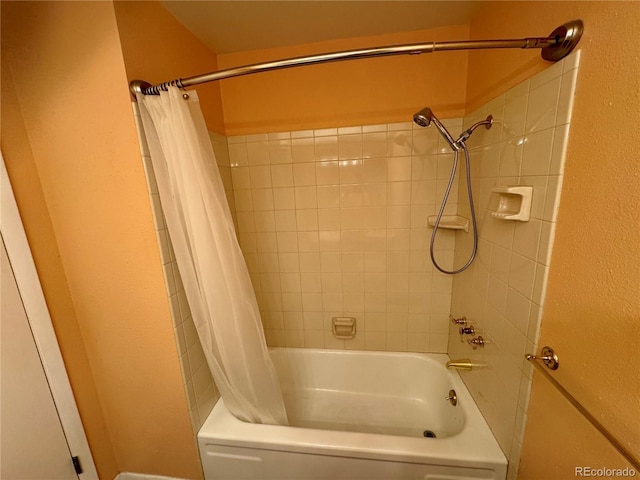 280 Raven Hills Rd, Colorado Springs, CO 80919 - bathroom featuring shower / tub combo with curtain and a textured wall