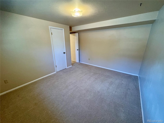 280 Raven Hills Rd, Colorado Springs, CO 80919 - carpeted empty room featuring baseboards