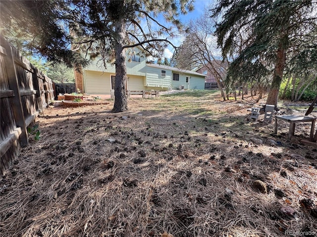 280 Raven Hills Rd, Colorado Springs, CO 80919 - view of yard with a fenced backyard