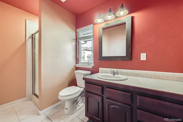 full bath featuring vanity, tile patterned flooring, a stall shower, and toilet