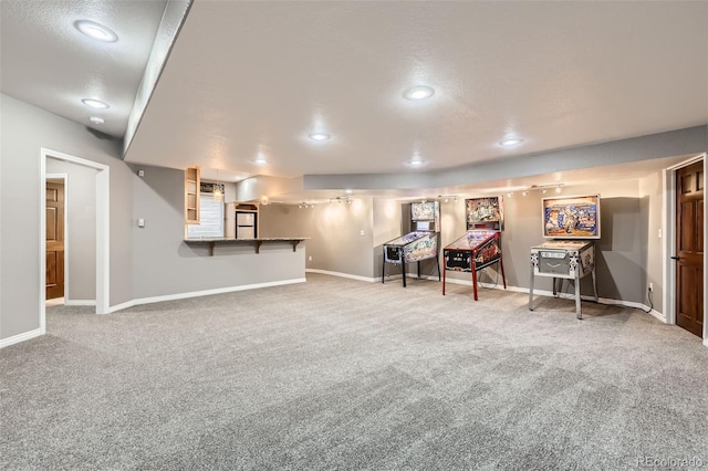 finished basement with carpet floors, baseboards, and recessed lighting