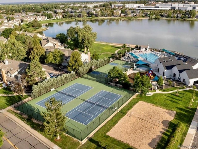 birds eye view of property featuring a water view and a residential view