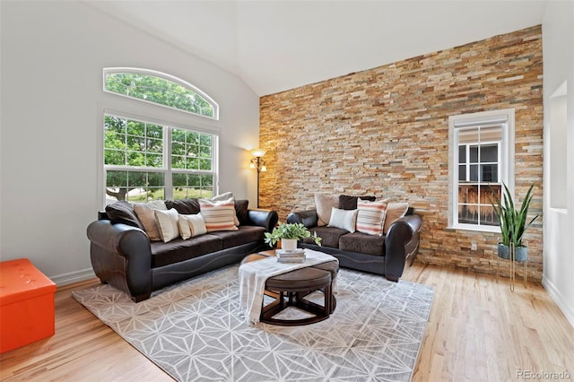9468 E Aspen Hill Ln, Lone Tree, CO 80124 - living room featuring wood finished floors and high vaulted ceiling