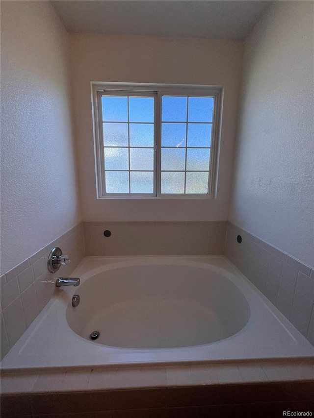 bathroom featuring a bathing tub