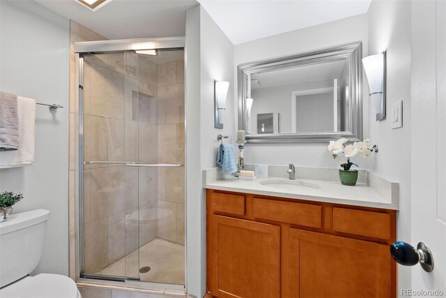 3131 E Alameda Ave Unit 803, Denver, CO 80209 - bathroom featuring vanity and a shower stall