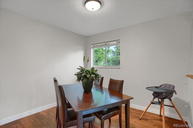 1010 Vondelpark Dr, Colorado Springs, CO 80907 - dining area with baseboards and wood finished floors